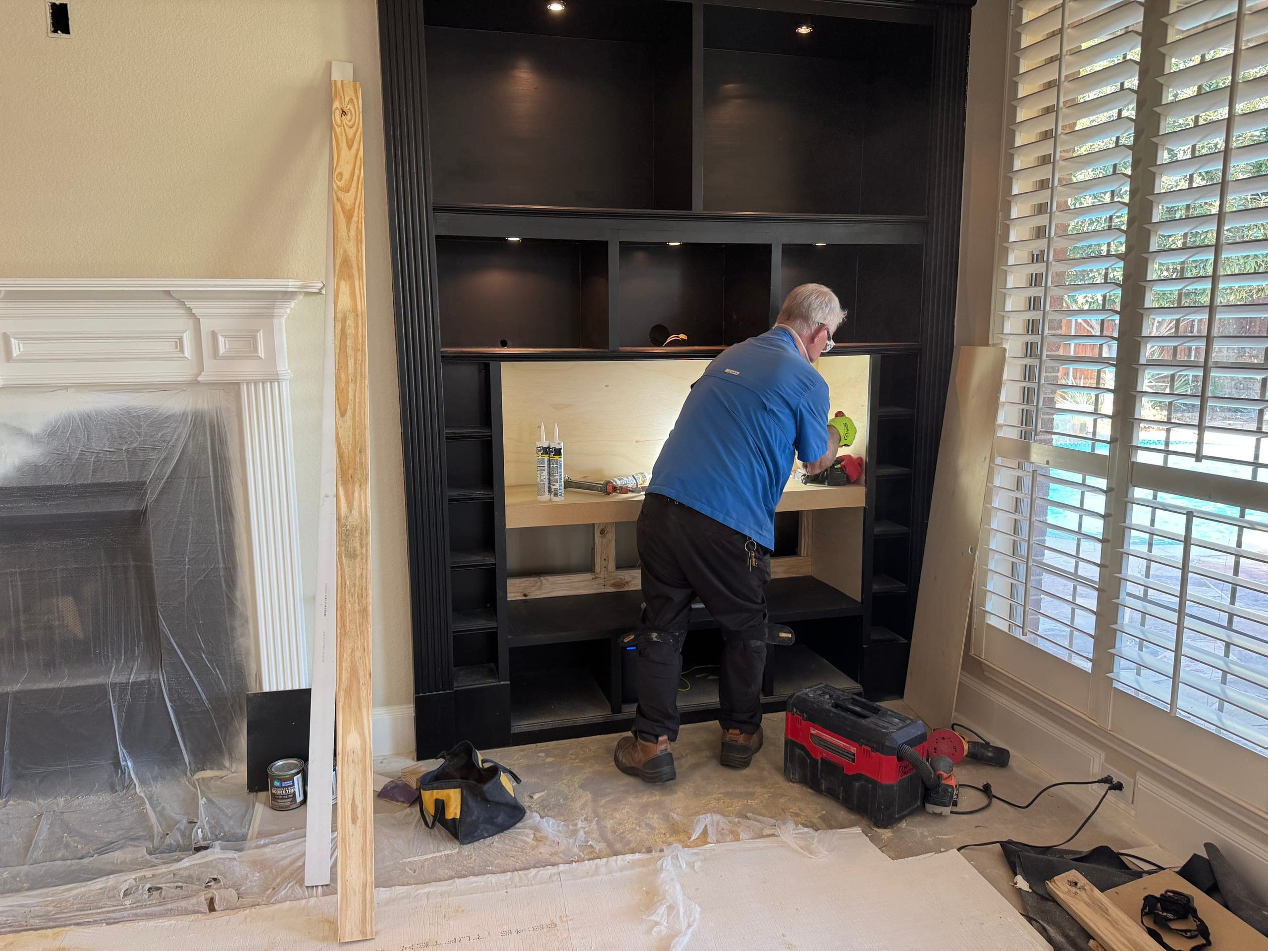 Built-in entertainment center in progress by Chilton Home Services